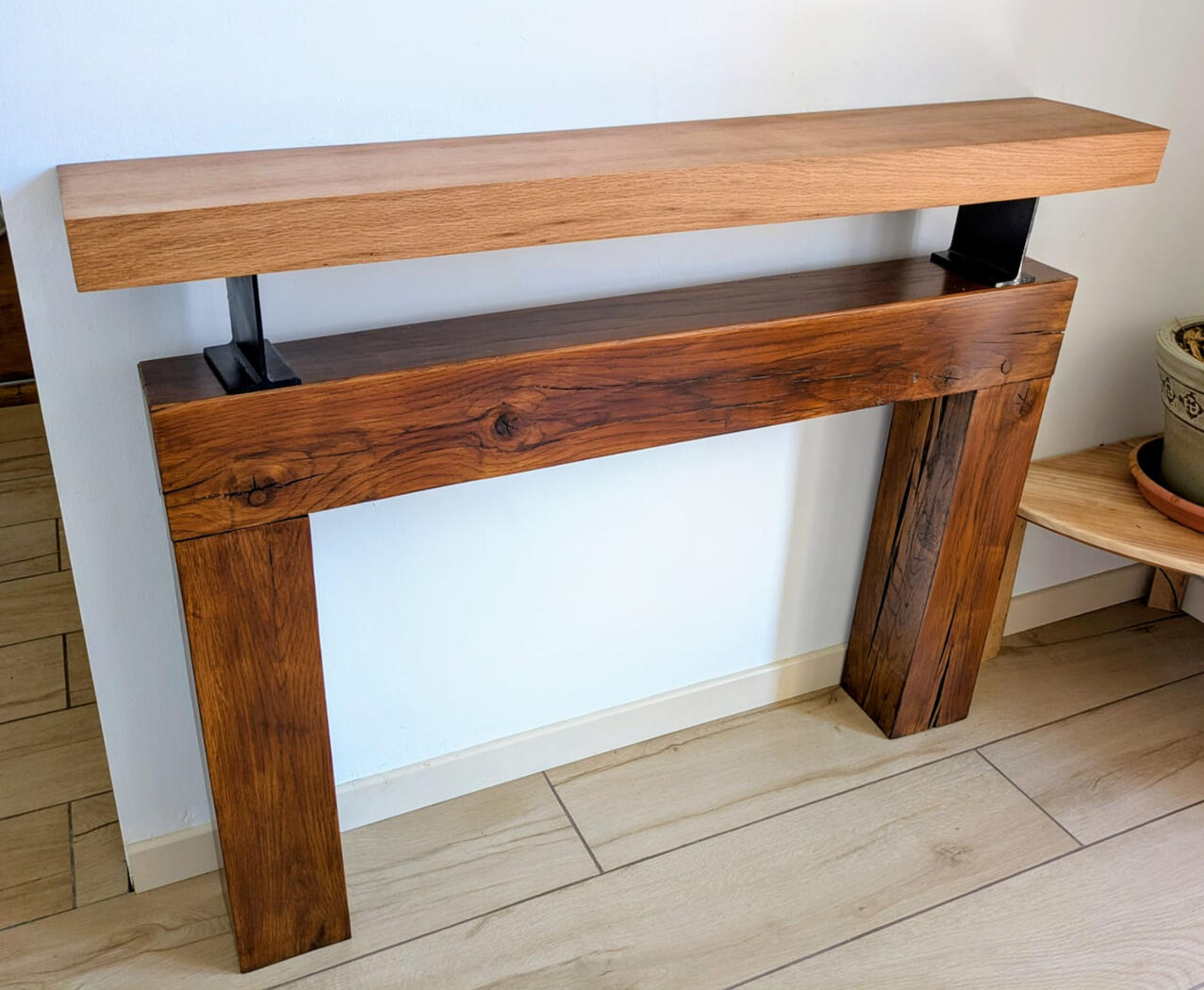 Salvaged oak mantelpiece, reclaimed oak beam, industrial steel beams, oil, wax. H: 90 cm x W: 120 cm | Functional installation