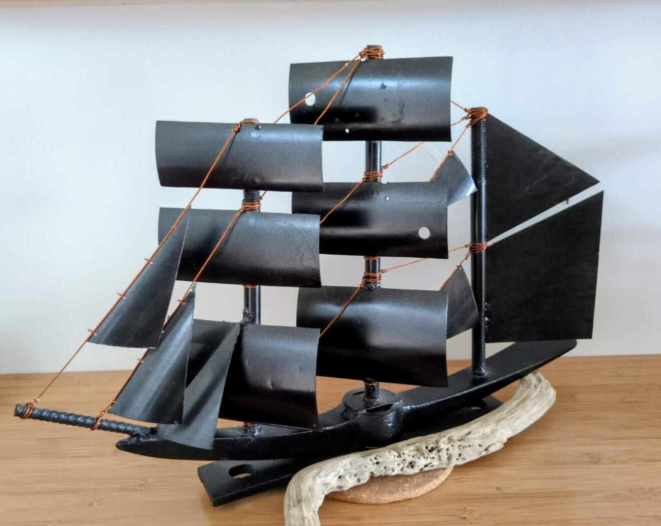 Barque - salvaged pickaxe head, electric motor casings, rebar, copper wire.